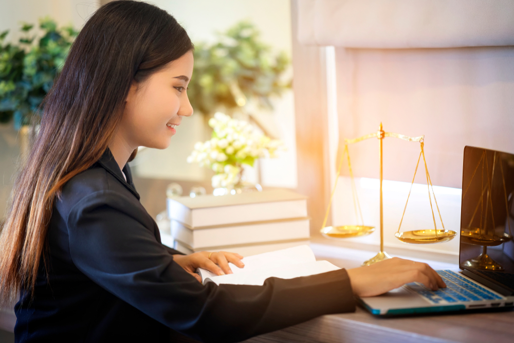 female lawyer working on laptop