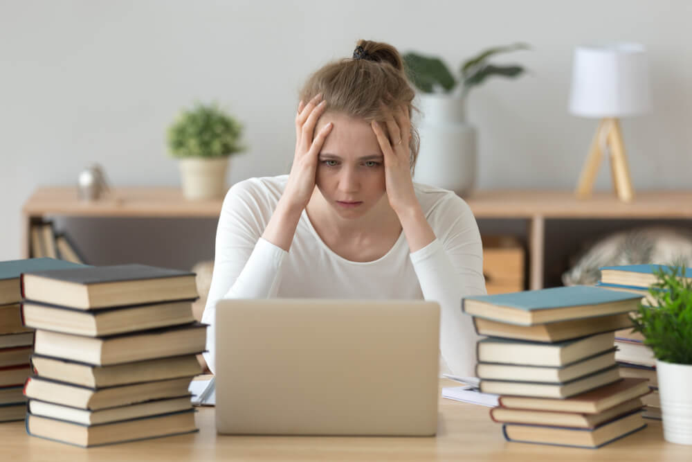 stressed college student at computer