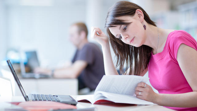 Female student studying in the library