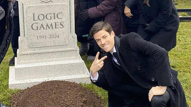 Young man standing over grave of Logic Games