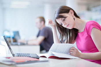 Female student studying in the library